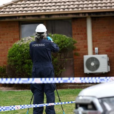 Woman charged over death of girls in house fire