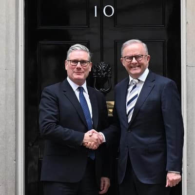 PM all smiles on subs pact after Downing Street chat