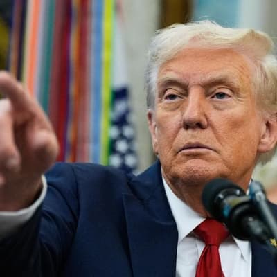 Trump warns of deep cuts in scramble to avoid shutdown