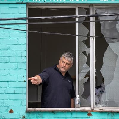 Bullet holes but no motive after street shooting spree