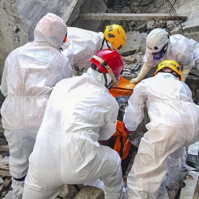 Search continues as Indonesia building toll rises to 49