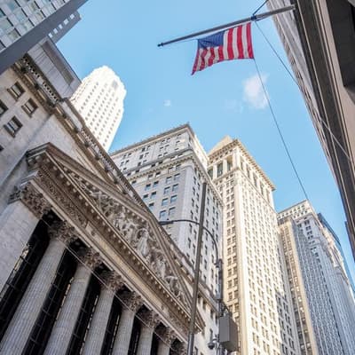 Wall Street closes lower, pausing record-setting rally