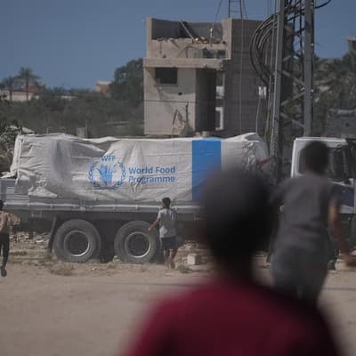 Aid trucks roll into Gaza Strip, Rafah opening expected