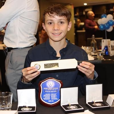 Local cricketers down bats in memory of killed teen