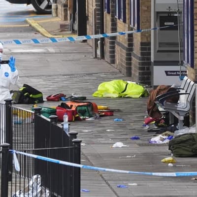 Two fighting for life after mass stabbing on UK train