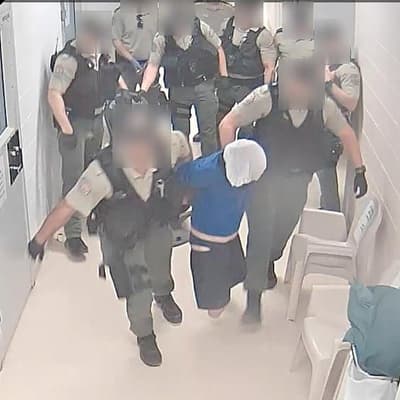 Inmate who had seizure roughly handled by prison guards