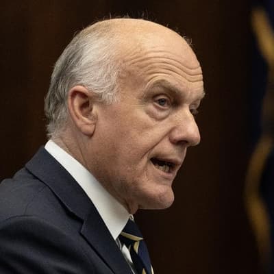 Ex-senator takes scalpel to spending in debut budget