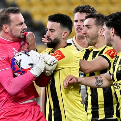 Nine-man Auckland beat Phoenix in fiery A-League derby