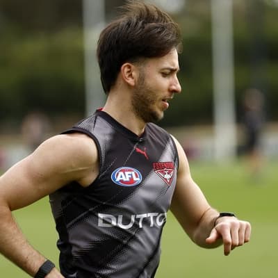Essendon star sent for scans on injured knee