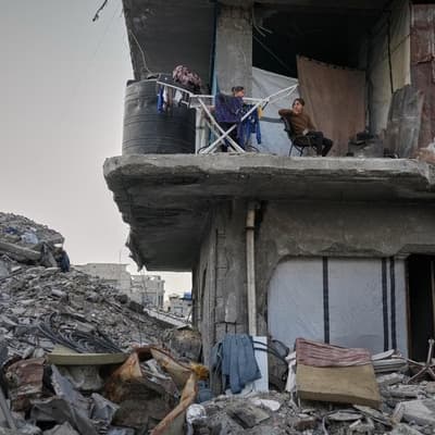 Israeli air strikes kill 25 in Gaza Strip, medics say