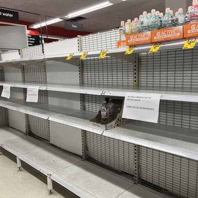Residents stock up on supplies to ride out storm