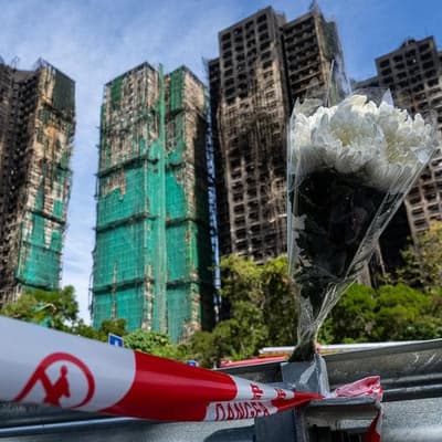 HK fire toll rises to 128, rescuers make final search