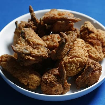 KFC chain upsizes sales but consumers wait in the wings