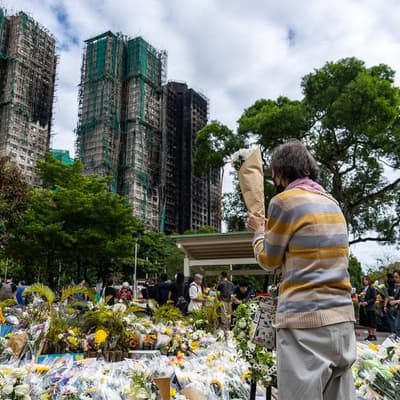 Hong Kong leader orders probe into deadly inferno