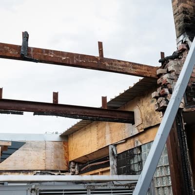 Jews to rebuild stronger a year after temple firebombed