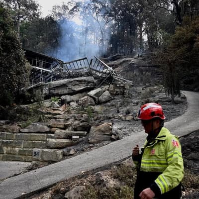 Firefighter dead as hot and dry weather spells danger