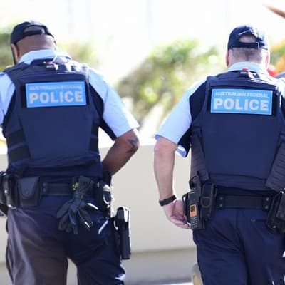 Swastika sword seized as men charged over Nazi symbols