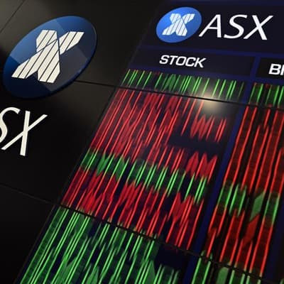 Aussie shares edge lower as RBA offers no surprises