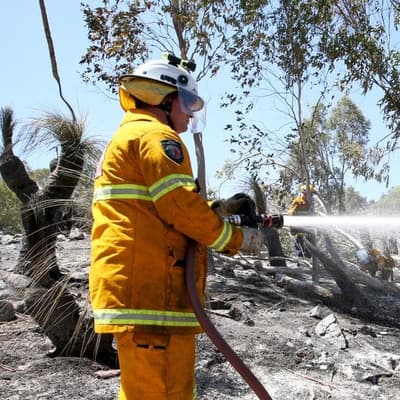 Firefighters under the pump as bushfires threaten homes