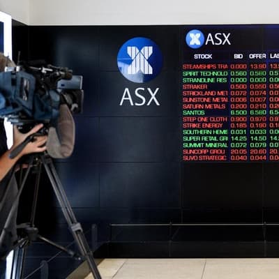 ASX shares slide to seven-year low after damning report