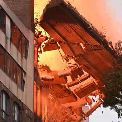 Huge fire that toppled Sydney CBD building contained