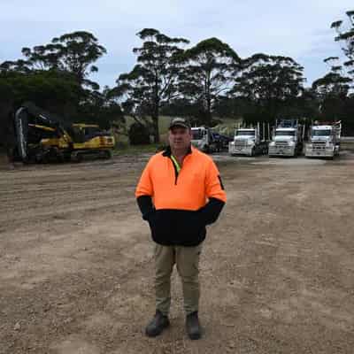 Early axing of logging falls hard on timber towns