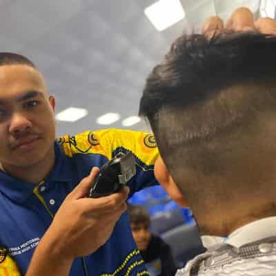 Country kids abuzz in transformational barber program