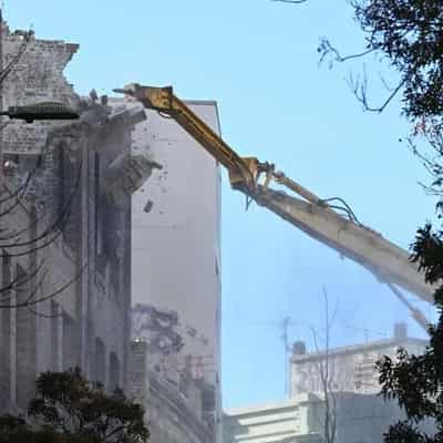 Demolition job begins on Sydney building gutted by fire