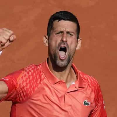 Pressure on as Djokovic guns for record 23rd grand slam