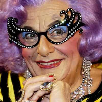 Barry Humphries one-ups Dame Edna with very nice medal