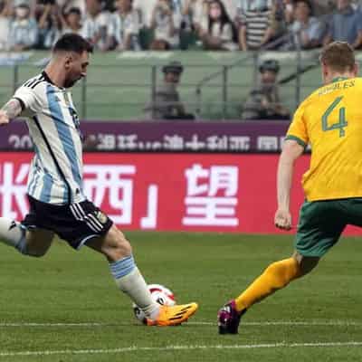 Messi inspires Argentina past Socceroos in Beijing