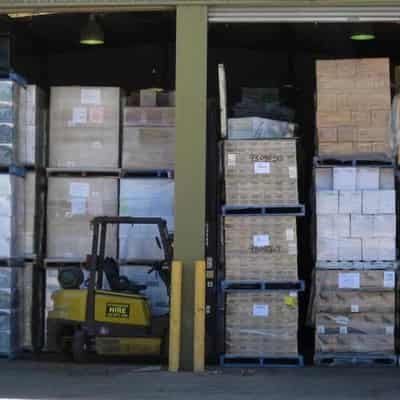 Woolworths worker dies after pallet stack collapses