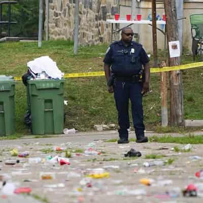 Two die, children among hurt in Baltimore mass shooting