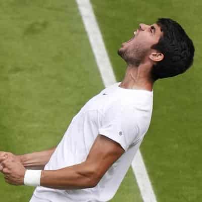 Alcaraz wins battle of the kids to make Wimbledon semis