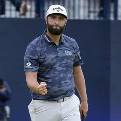 Runaway Open leader Harman hunted by big beast Rahm