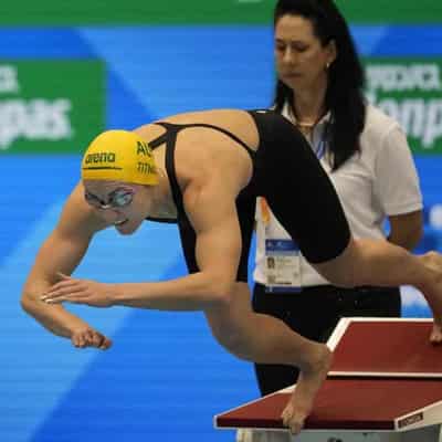 Aussie relayers, Titmus break swim world records