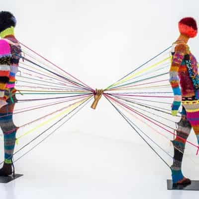 Yarn sculpture shows ties that bind in HIV science art