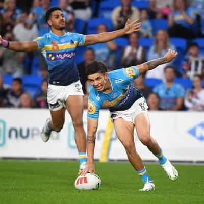 Titans upset Cowboys, Valentine Holmes on report