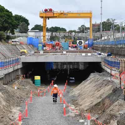 Workers return to cross-river rail after dangerous fall