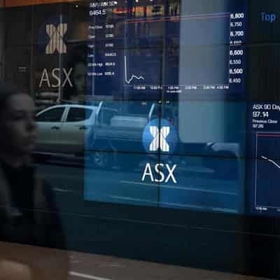 Aust stocks finish higher after RBA extends rate pause