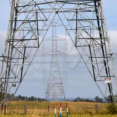 Sparks fly over planned power lines across farming land