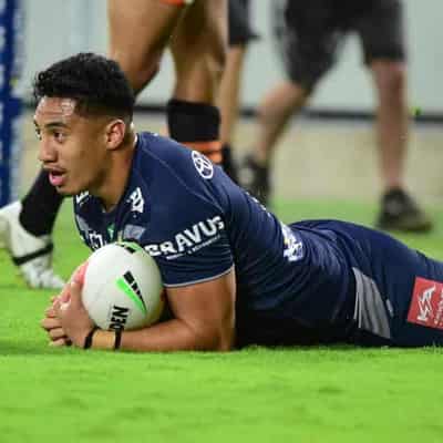 Taulagi trains in Holmes' left centre spot for Cowboys