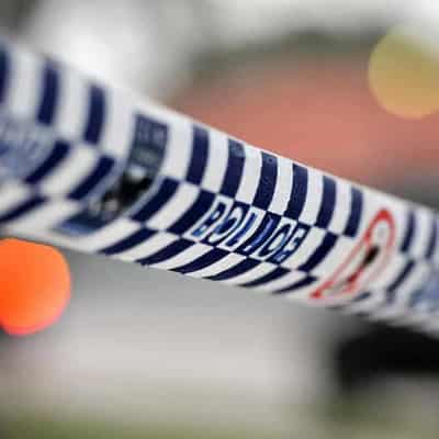 Man critical as homicide detectives probe woman's death