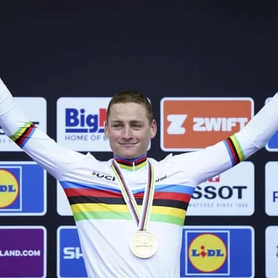 Van der Poel rises from crash to win world road race