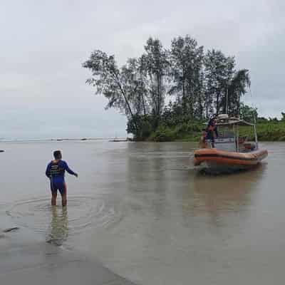 Rescuers search for four missing Aussies off Aceh