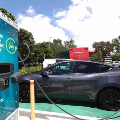 Premier warns he could unplug electric car subsidies