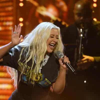 Christina Aguilera, Peter Garrett to headline concerts