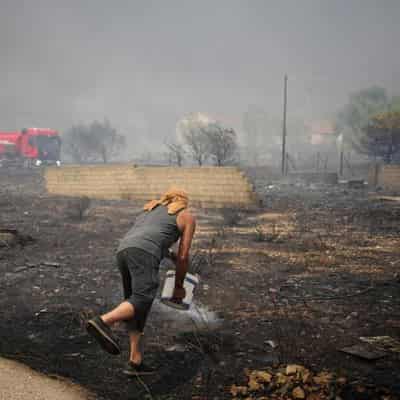 Risk of more blazes in Greece as fire near Athens rages