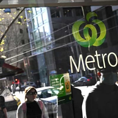 Woolworths says cautious customers are cutting back