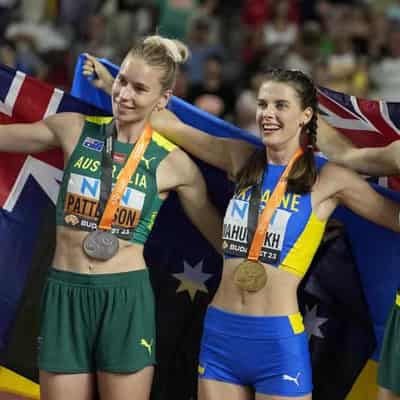 High jump medals for Patterson and Olyslagers